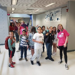 Web Leaders helping 6th graders find their classrooms 