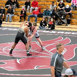 Wrestler engages with opponent