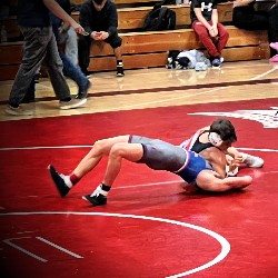 Wrestler pins opponent