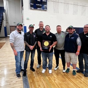 Coaches with trophy