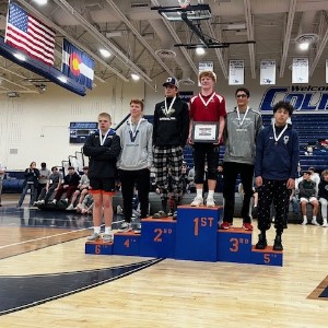 Wrestlers on podium 11