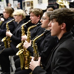 Saxophone students in the warm-up room.