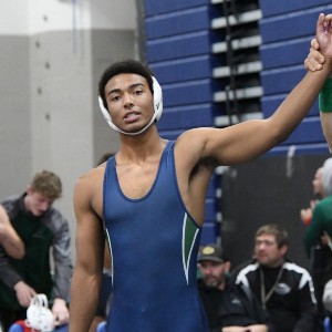 Wrestler celebrating a win