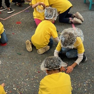 Students playing in glitter.