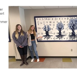 NAHS members with the tree of life mural