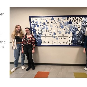 NAHS members with the bubbling beakers mural.