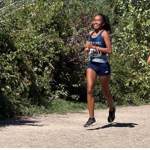 Girl running and smiling