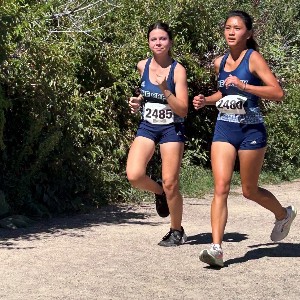 Two girls running