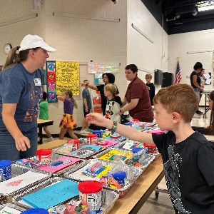 students pack sprinkles into their birthday boxes