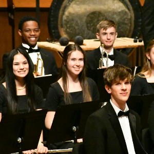 Band students standing after their performance