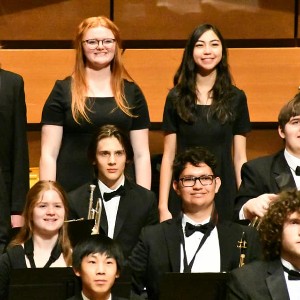 Students standing after their performance