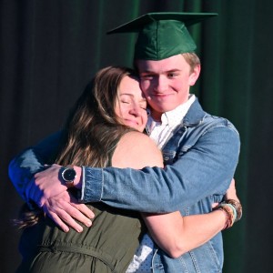 Boy hugging his mom