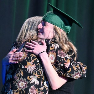 Girl and mom hugging