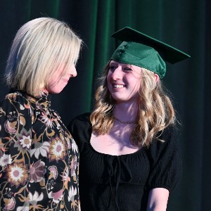 Girl and mom laughing