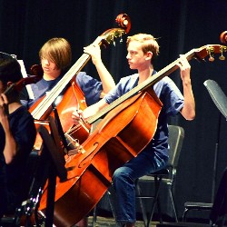 Orchestra Student Playing at Future Eagles Orchestra Concert