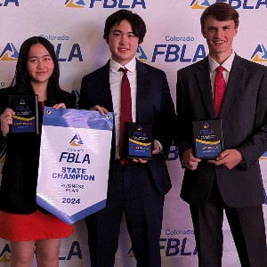 Three students with awards