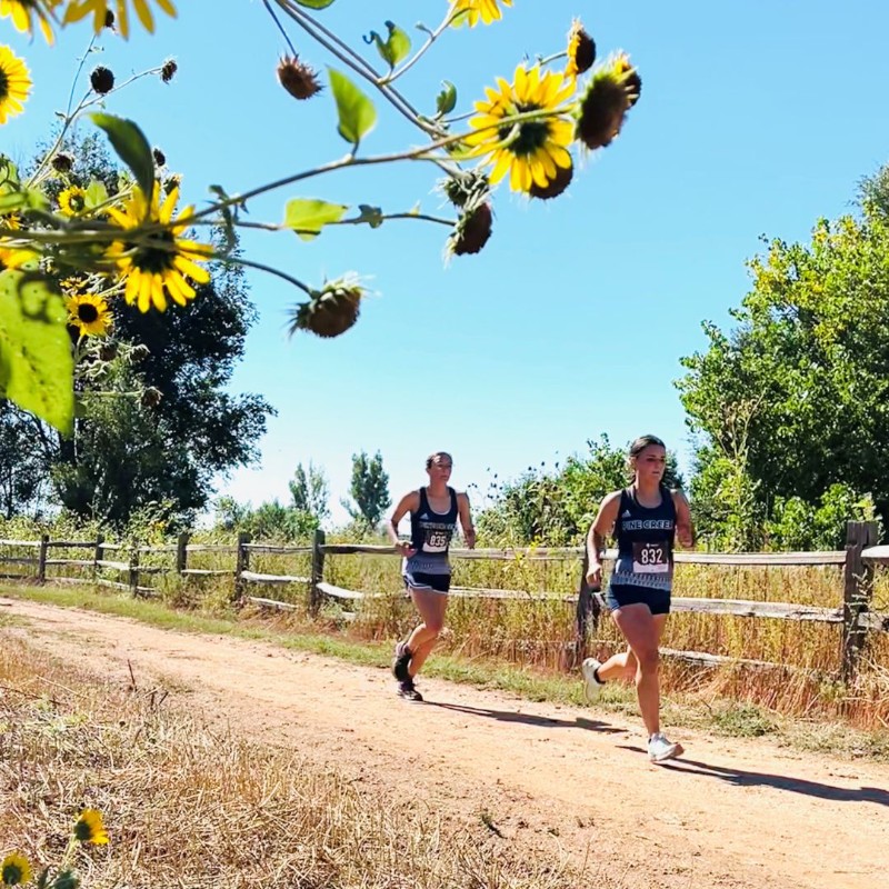 Girls running race course