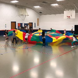 Students participate in a group activity in the High Plains Elementary School gym.
