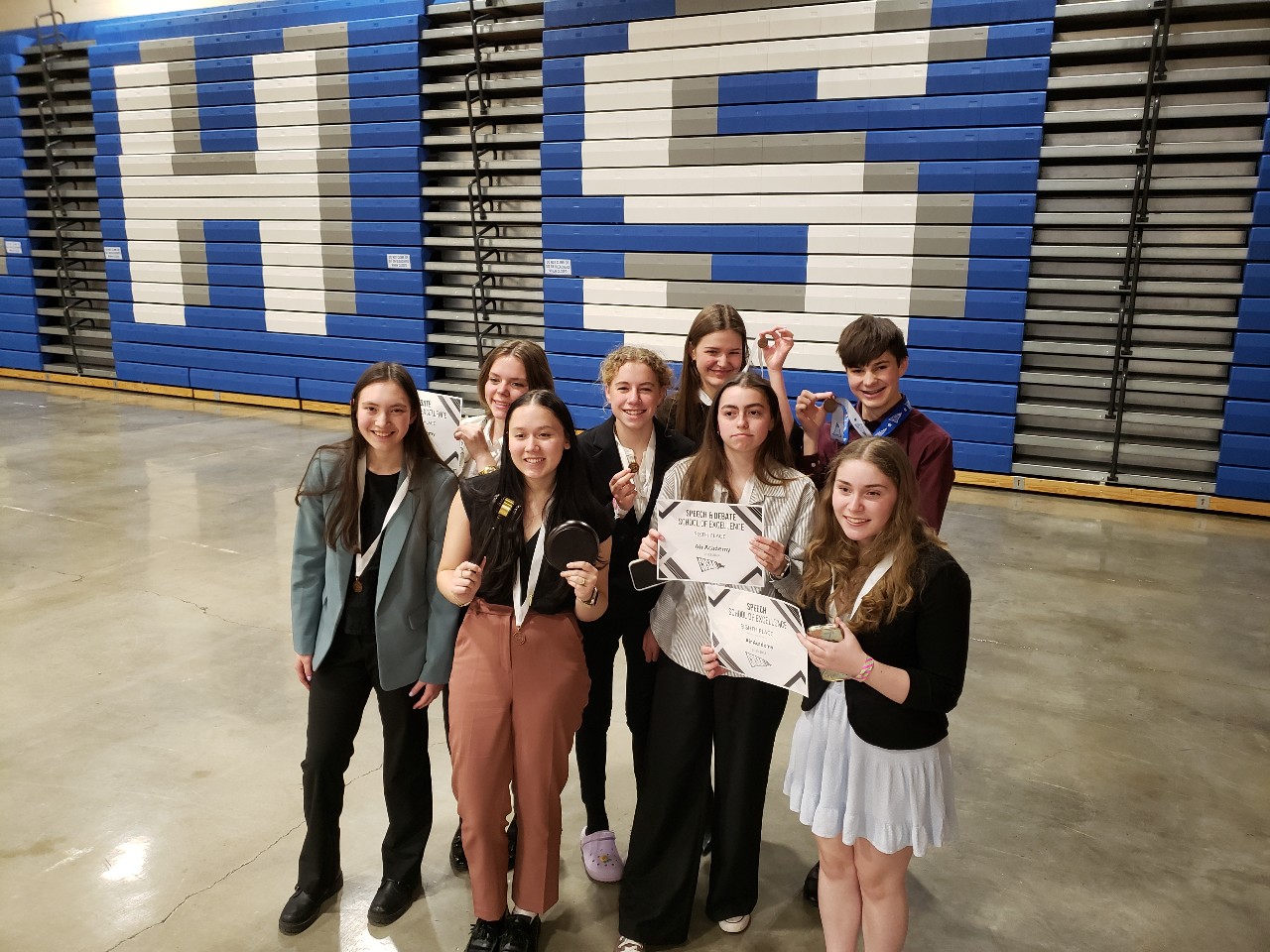 Group shot of AAHS speech and debate competitors