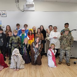 Large group of students dressed in costumes