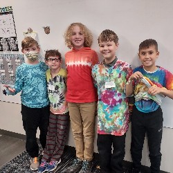 Students wearing tie-dye shirts