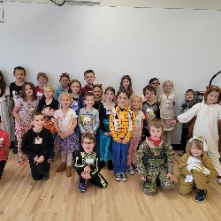 Large group of students dressed in costumes