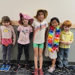 5 students dressed for the beach