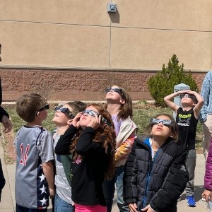 1st graders experiencing the solar eclipse