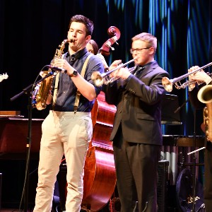 Two musicians playing on stage