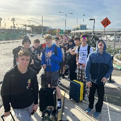 Group of wrestlers travelling to compete