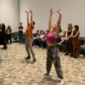Boy and girl participating in a dance workshop