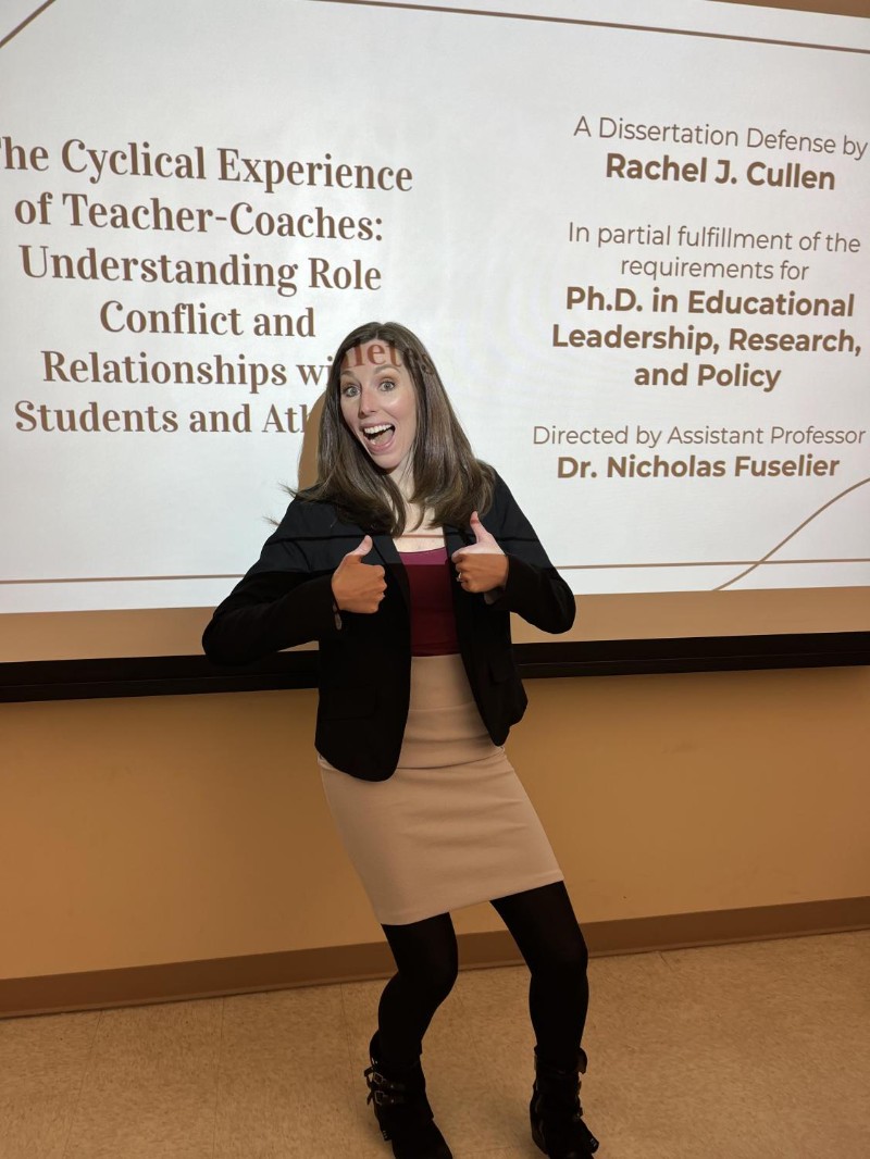 Dr. Cullen celebrates defending her dissertation to earn her doctorate.