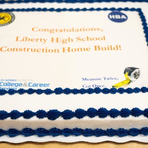 Photo of a sheet cake celebrating Liberty High School Construction Home Build Project.