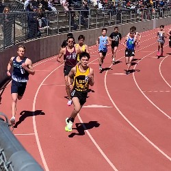 Boys racing - Pine Creek runner on the left