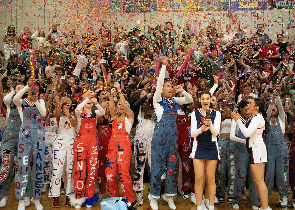 Students celebrate during an assembly.