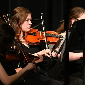 student playing violin