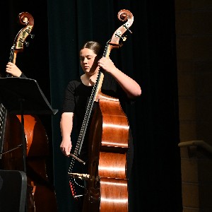 Student playing bass