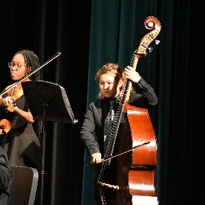 Student playing upright bass