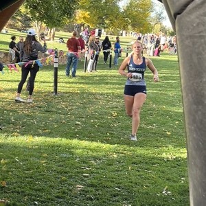 Girl running through tunnel