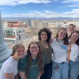 Liberty students stand on the top balcony of the State Capitol building looking over Denver during a field trip on Thursday, April 13.