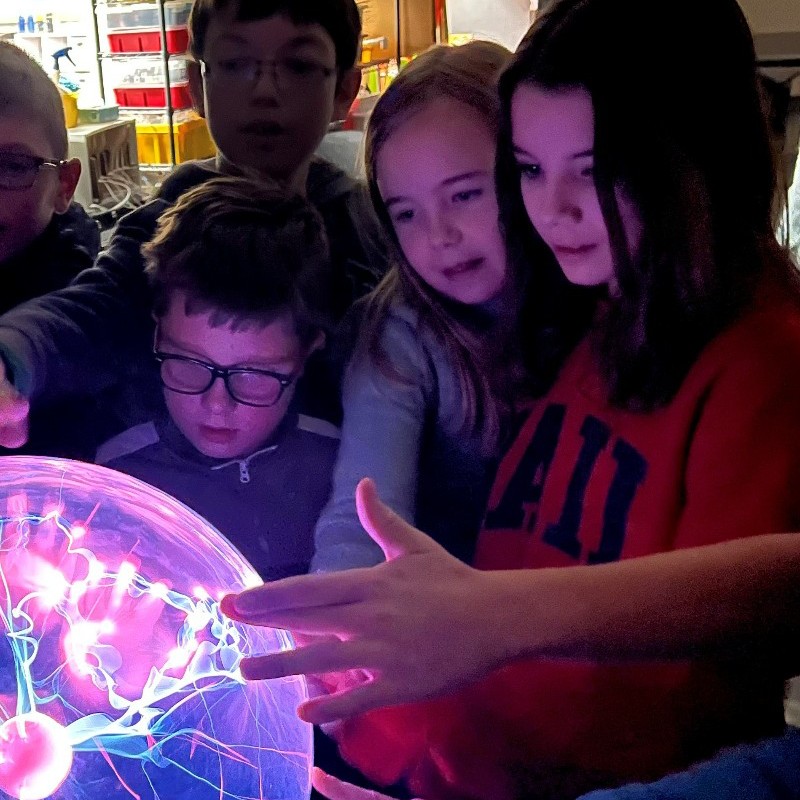 Students learning about electricity with a static ball
