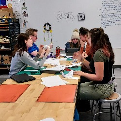 Students crafting and talking