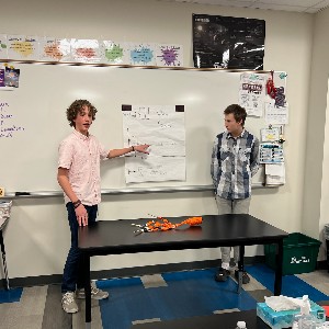 Students presenting their invention.