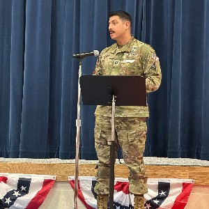 Capt. Sanchez from U.S. Space Command speaks at the EES Veterans Day assembly.