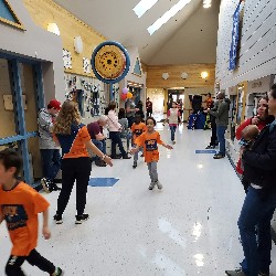 Students running at the Apex fun run