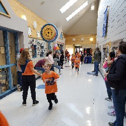 Students running at the Apex fun run