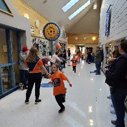 Students running at the Apex fun run