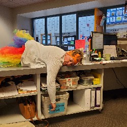 Mrs. Driver laying on counter exhausted after running