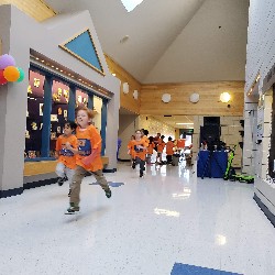 Students running at the Apex fun run