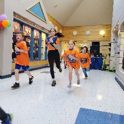 Students running at the Apex fun run